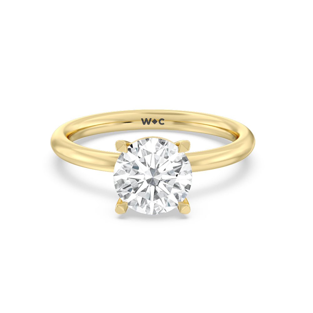 Radiant Petite Four Prong Solitaire