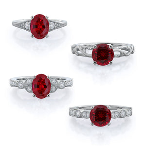Four vintage style ruby rings, in 14 kt white gold