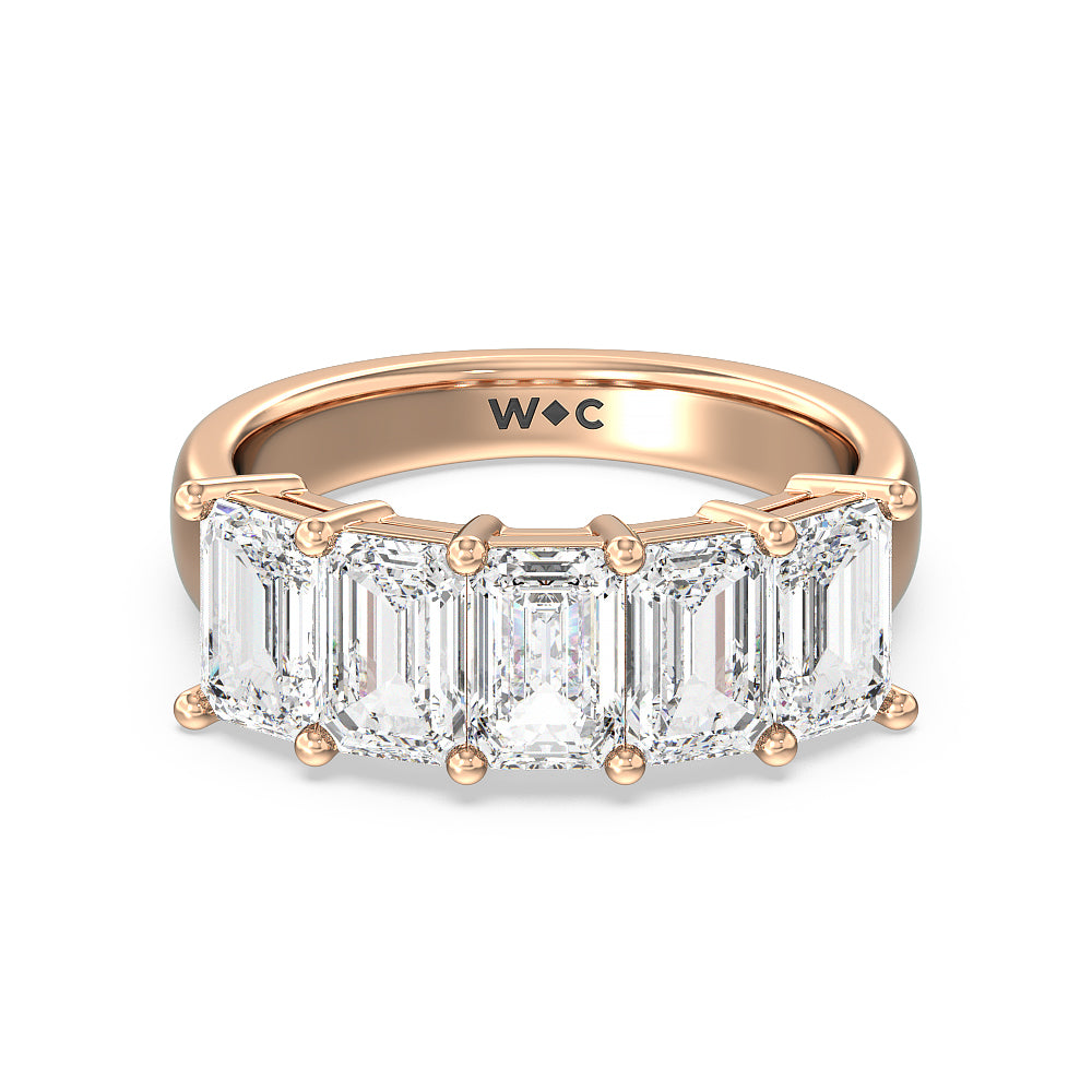 5 stone emerald cut store diamond ring