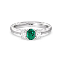 Created Emerald Center And Oval Cut Three Stone Diamond Ring