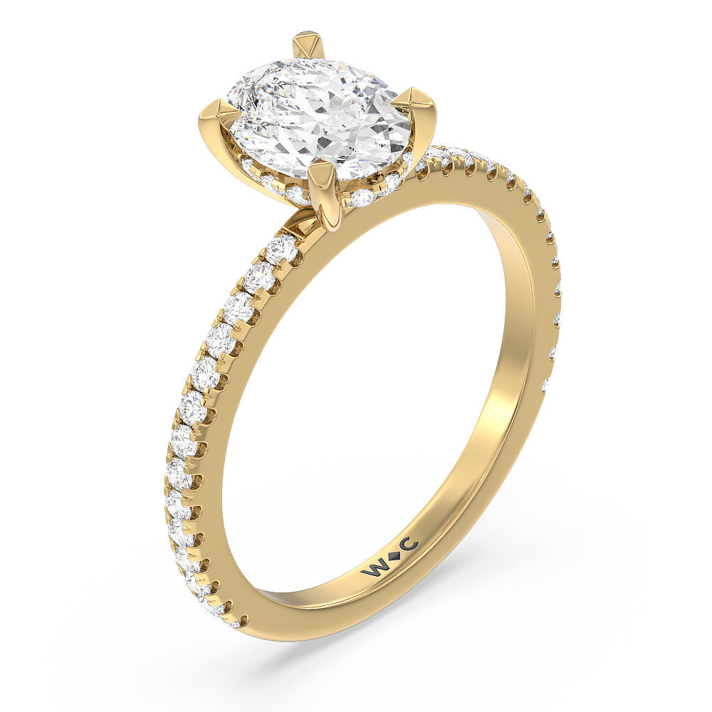 The Classic Hidden Halo Oval Engagement Ring in Yellow gold